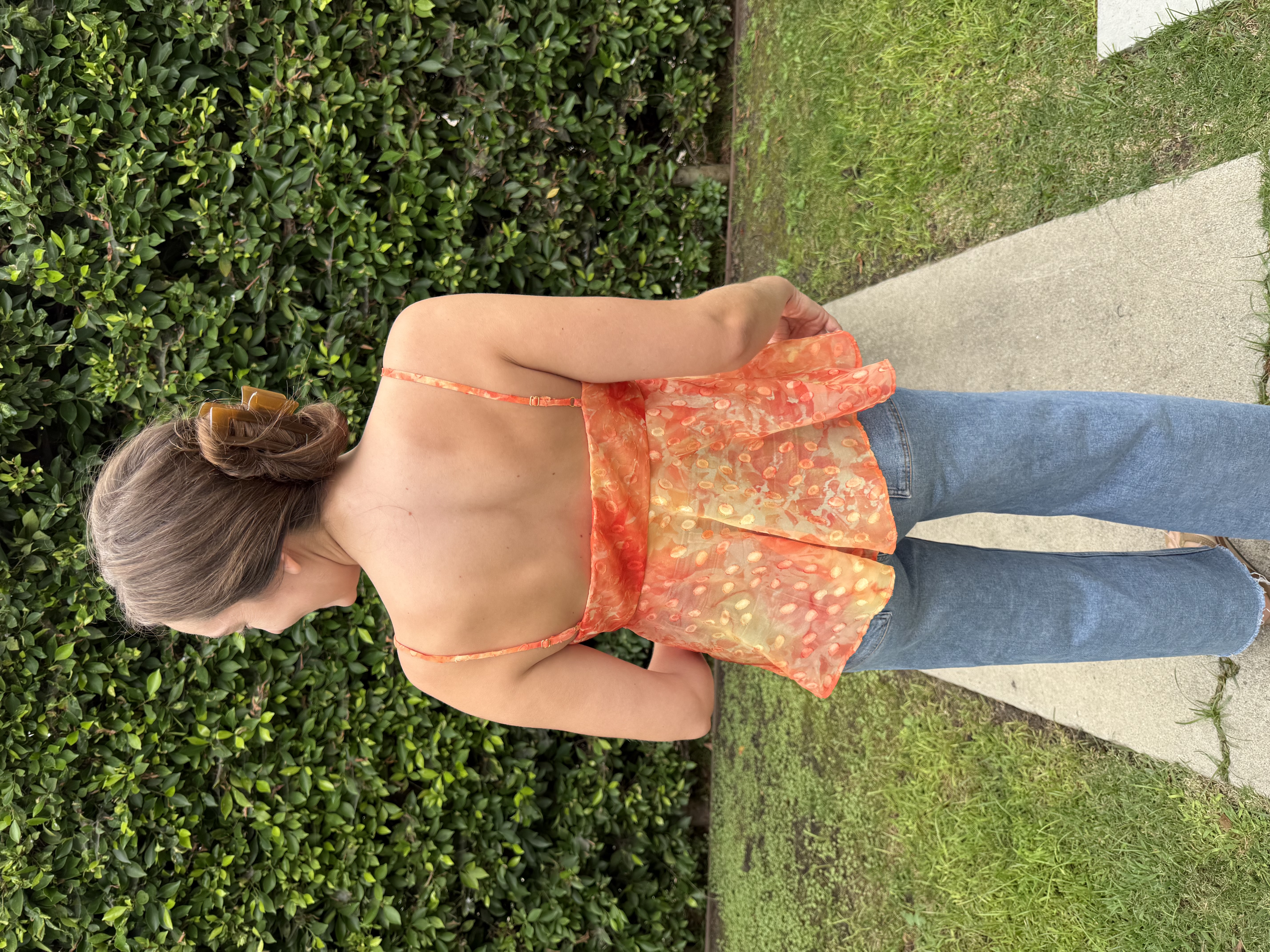 Back view of the Jaya Top, showing the bra straps and back of the top